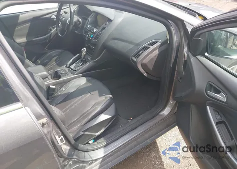 2012 Ford Focus Titanium z USA, uszkodzony, nr VIN 1FAHP3N29CL365618